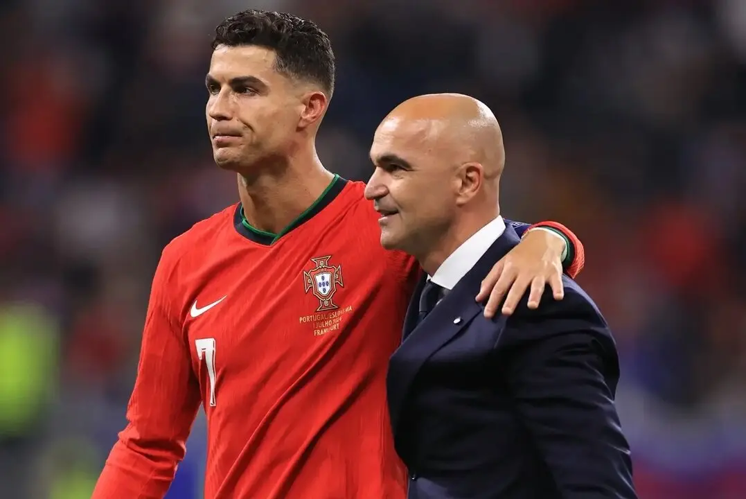 Roberto Mart&iacute;nez junto a Cristiano Ronaldo / GETTY