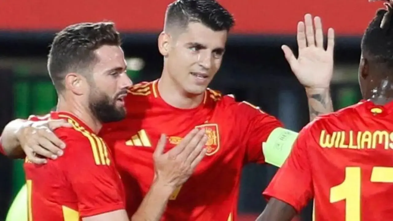 Morata y Nacho / AFP