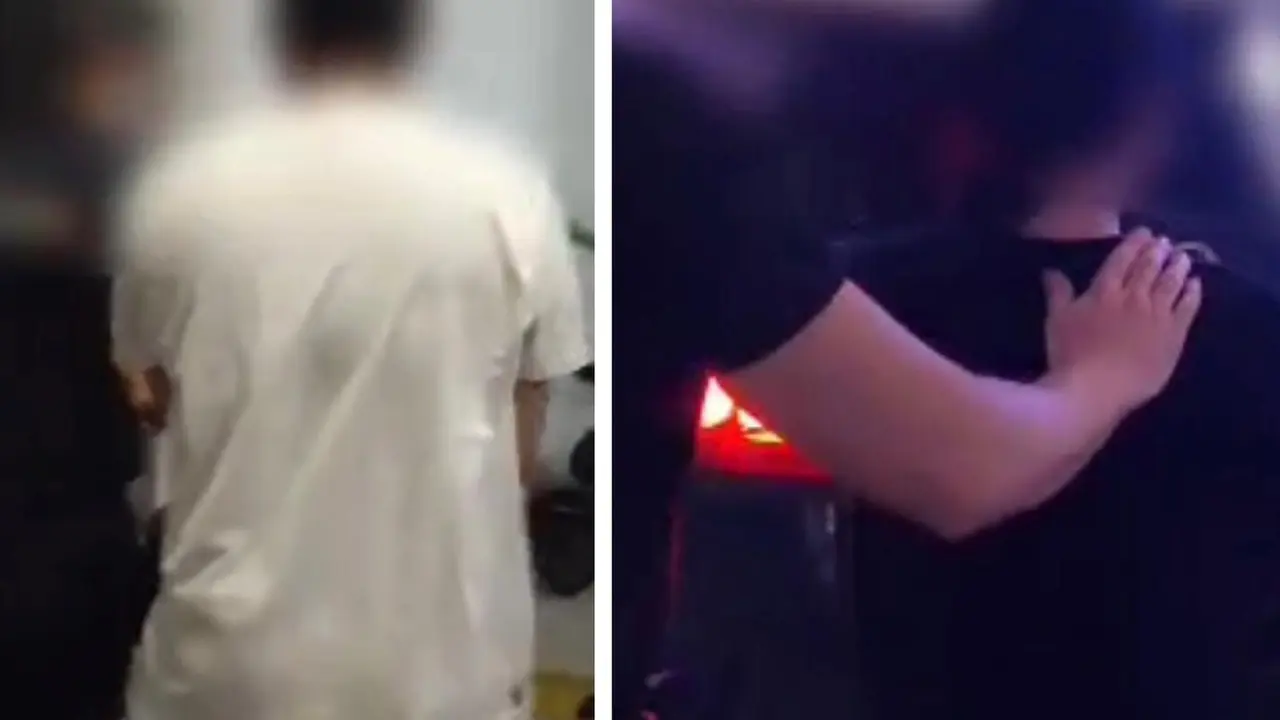 Imagen de los dos detenidos conducidos por agentes de la Polic&iacute;a Nacional /PN
