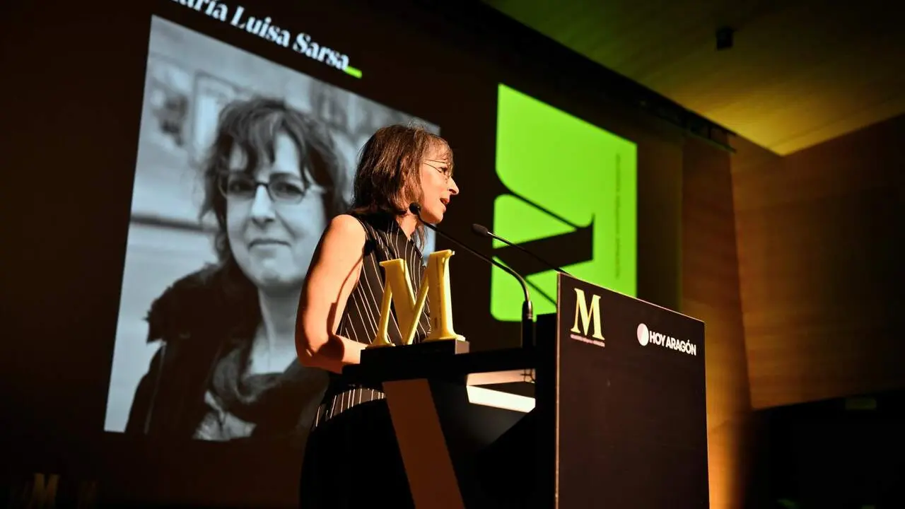Mar&iacute;a Luisa Sarsa, recogiendo el galard&oacute;n. /HOY ARAG&Oacute;N