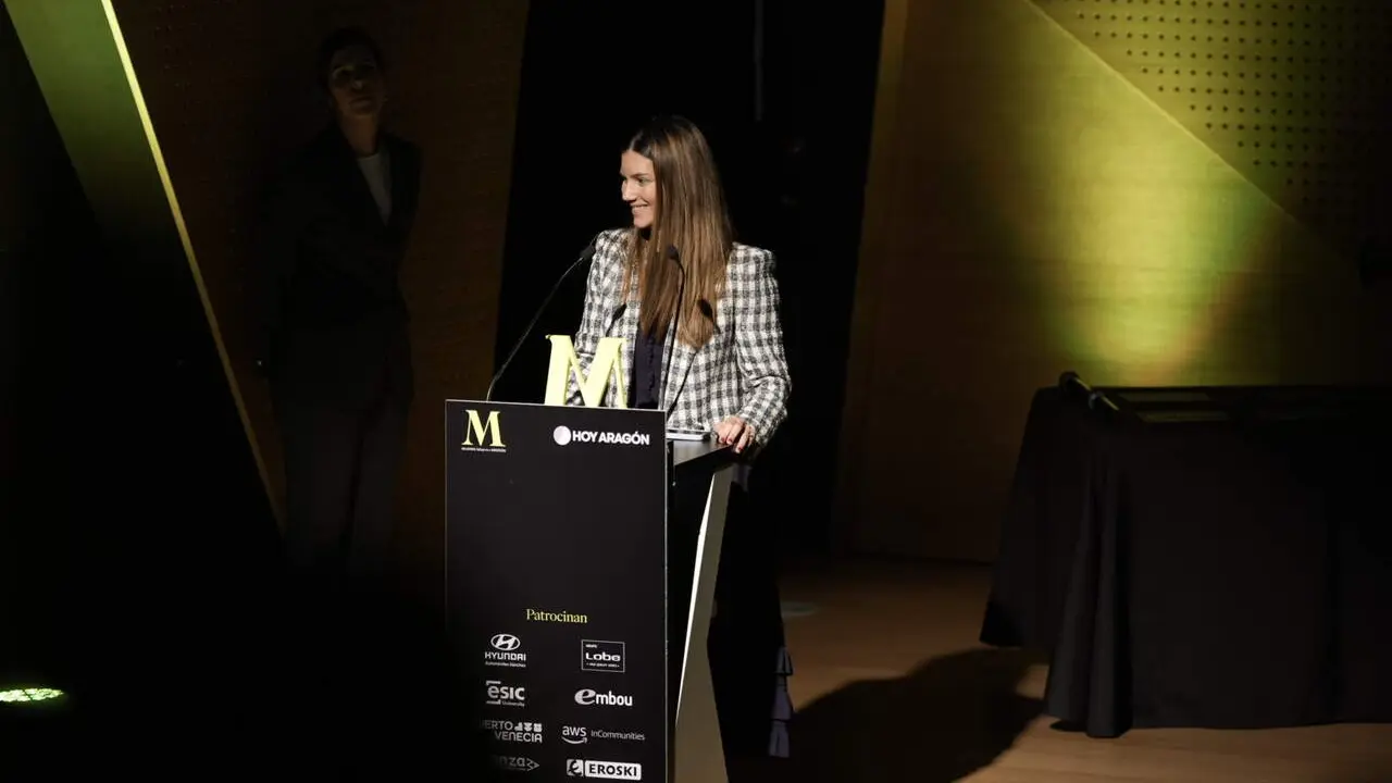 Pilar Romero, recogiendo el galard&oacute;n. / HOY ARAG&Oacute;N