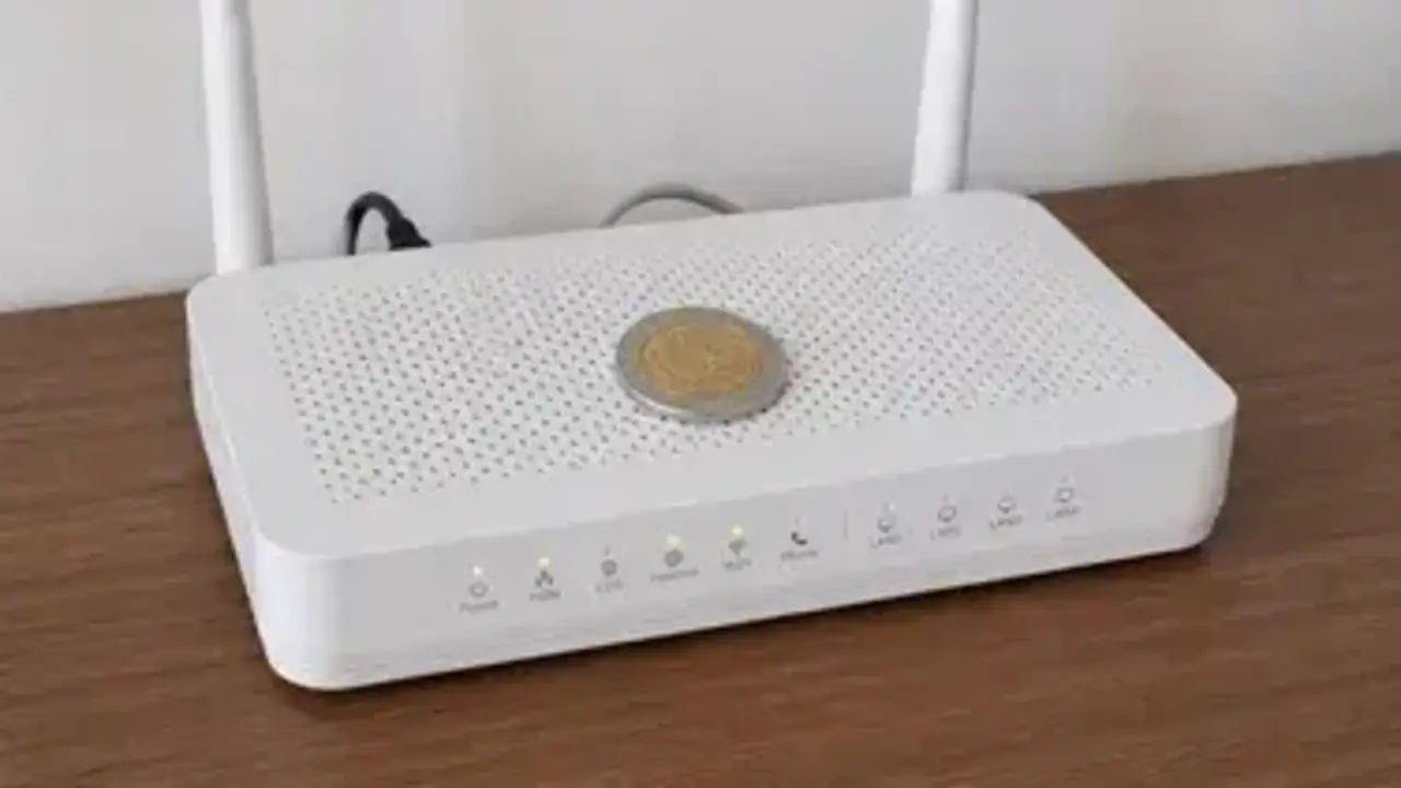 Poner una moneda encima del router WiFi