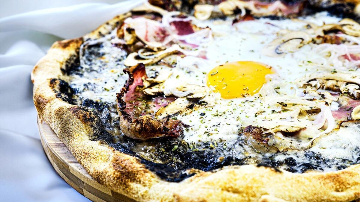 Pizza La Trufadita. / La Porción