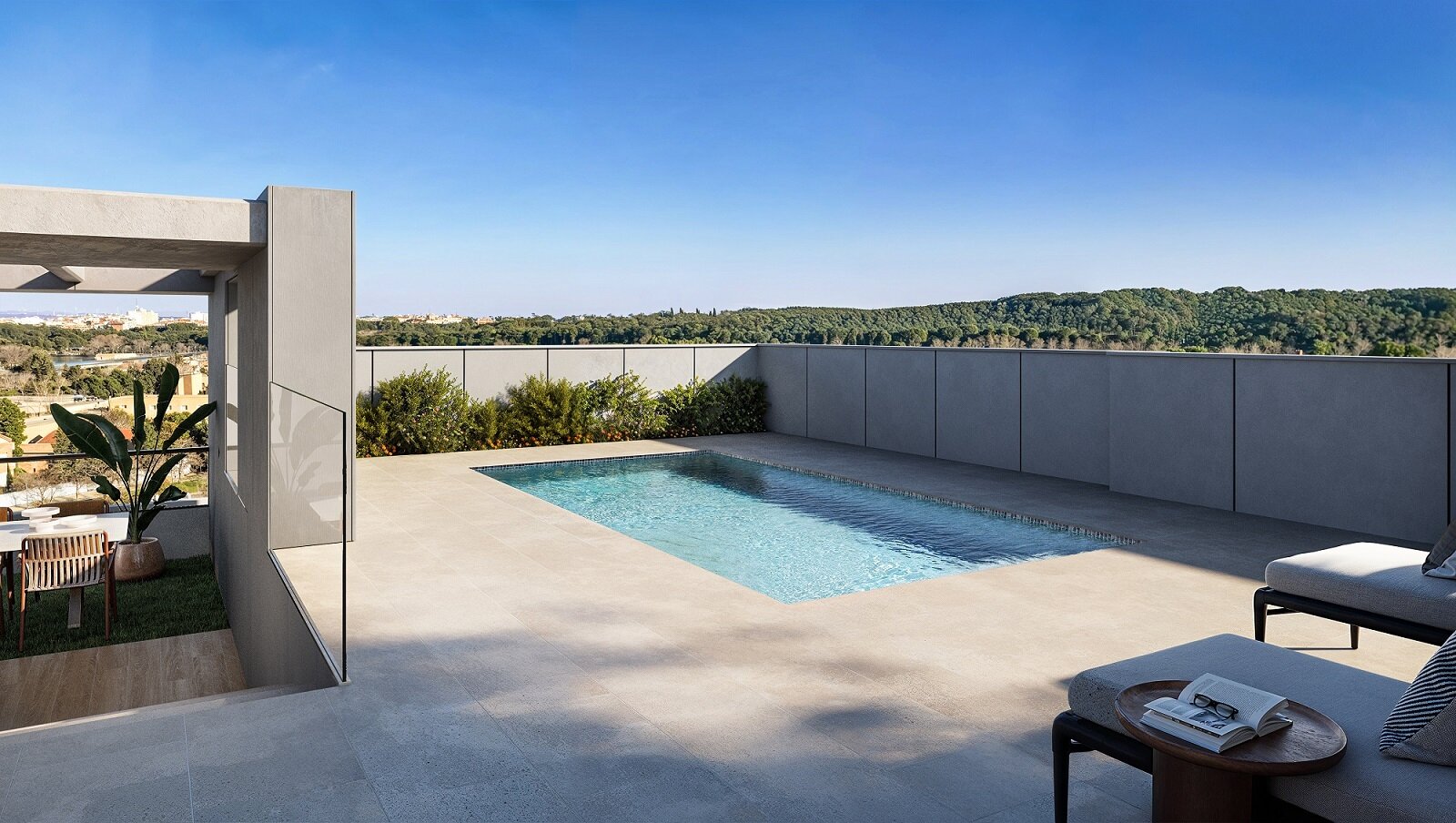 Piscina privada en una de las terrazas de una vivienda en planta ático / Gestión Común