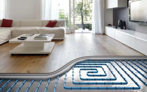 Vista de un salón moderno con suelo radiante, una solución que distribuye el calor de forma uniforme