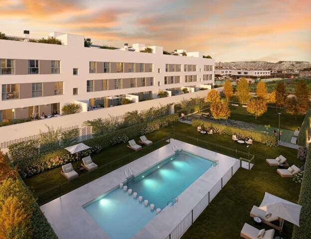 Los Nogales presenta una zona común única en Utebo ys u entorno, destacando por su amplitud y equipamiento de piscina, zona verde, juegos infantiles y espacio para picnic y bicicletas. / LUJAMA