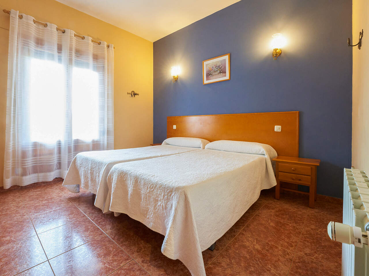 Habitación triple Hotel la Rueda